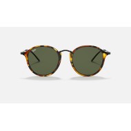 ROUND FLECK
Lenses: Green Classic G-15  +  Frame: Spotted Black Havana