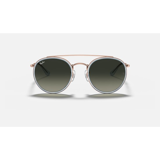 ROUND DOUBLE BRIDGE
Lenses: Grey Gradient  +  Frame: Light Blue